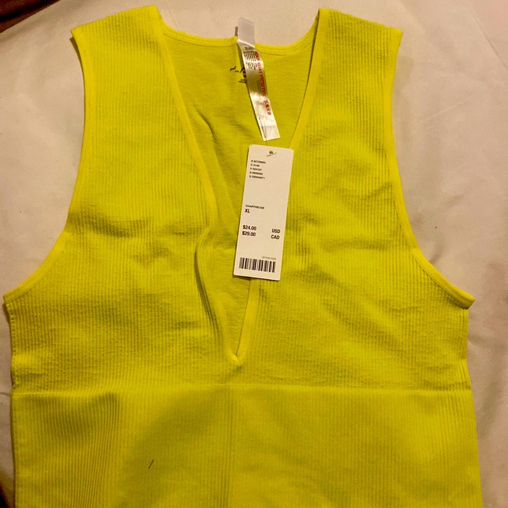 Yellow bralette fits like a M hold the girls in